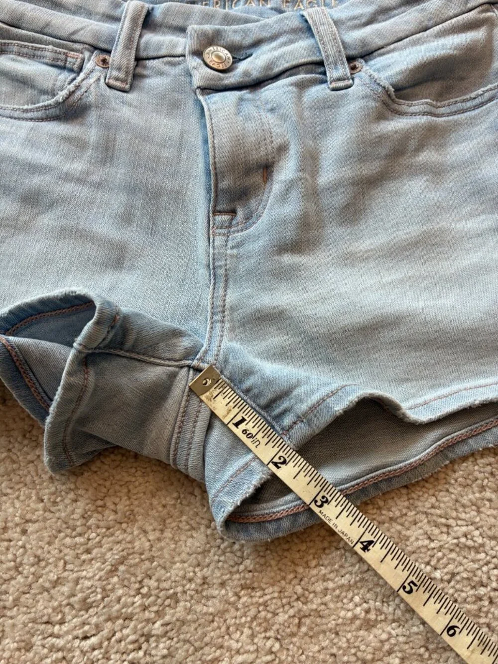 American Eagle Curvy High-Rise Shortie Stretch Jean Cross-Front Button Shorts - Picture 14 of 14